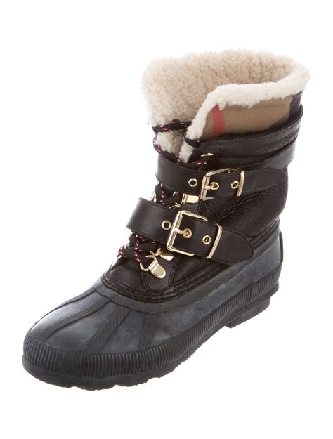 burberry shearling lined snow boots|Burberry check back boots.